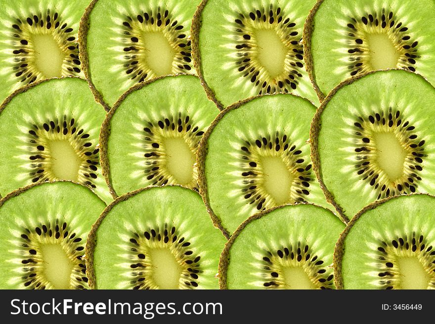 Background from the slices of green kiwi. Background from the slices of green kiwi