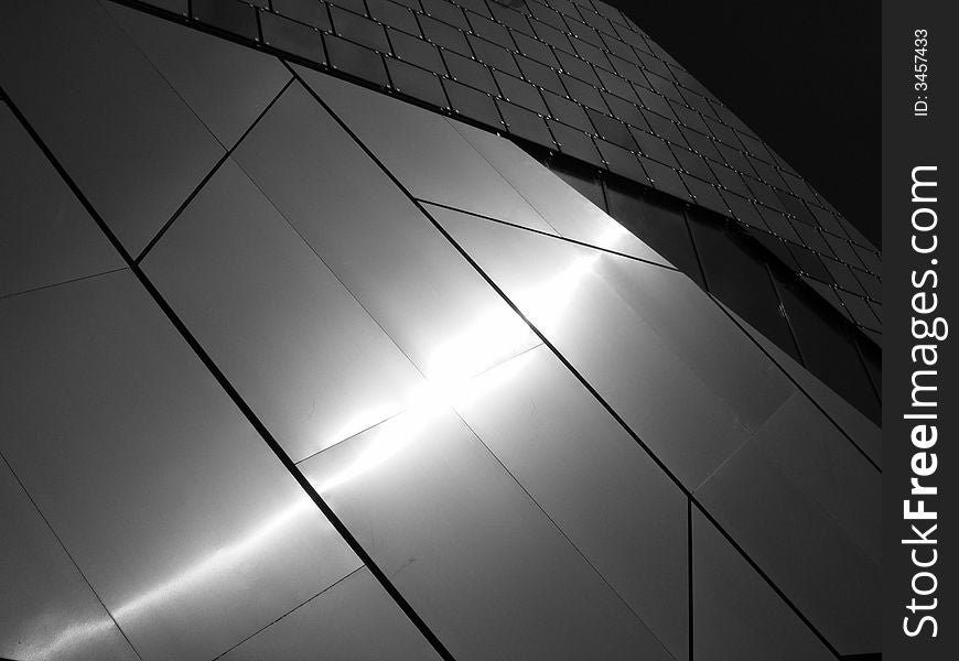 Light reflected off a modern building. Light reflected off a modern building.