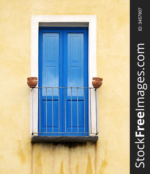 Close blue window in Italy