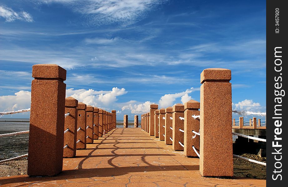 Smart focus a port jetty image on the clouds skies