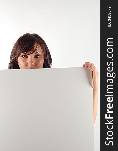 Attractive woman holding blank banner on white background. Attractive woman holding blank banner on white background