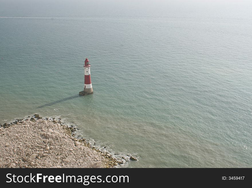A view over a lighthouse in the south coast of England near Beachy-Head.  . A view over a lighthouse in the south coast of England near Beachy-Head.