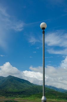 Blue Sky And Mountain Background With Lamp Pole Royalty Free Stock Photos Blue Sky And Mountain Background With Lamp Pole Royalty Free Stock Photos