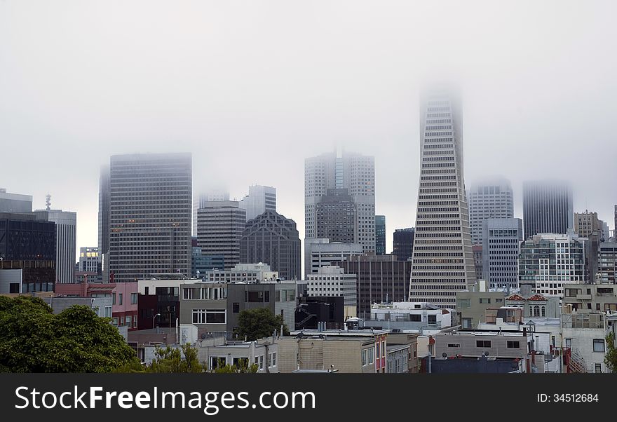 Heavy fog lingers over the Trans America building in San Francisco. Heavy fog lingers over the Trans America building in San Francisco