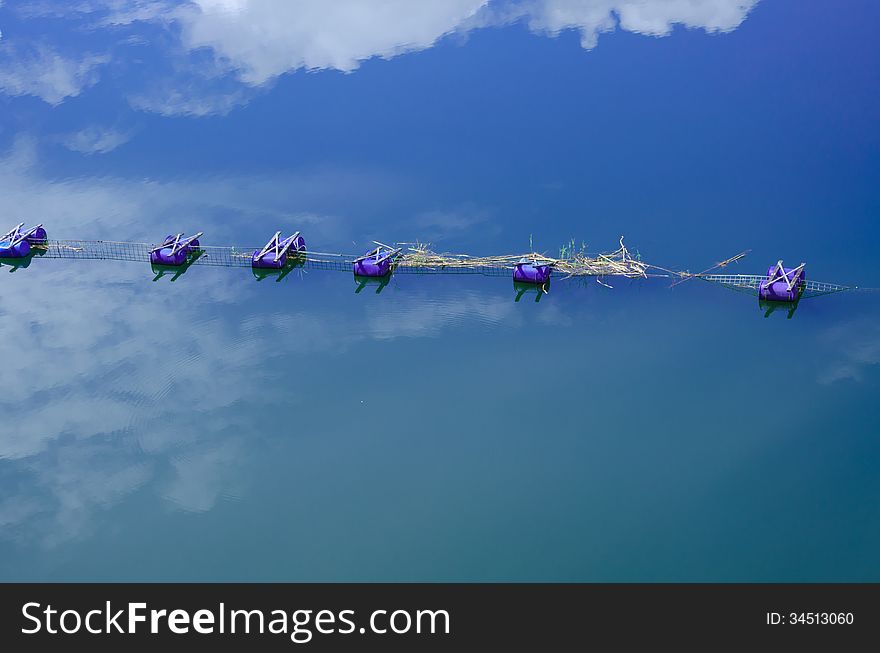 Buoyancy on water reflects the sky in dam Thailand