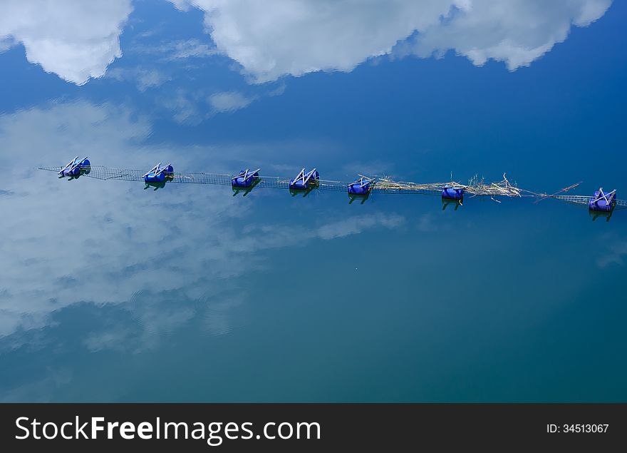 Buoyancy on water reflects the sky in dam Thailand