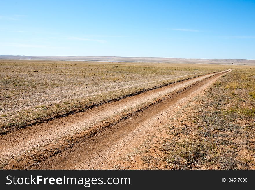 The road in the desert. Inner Mongolia, China. The road in the desert. Inner Mongolia, China