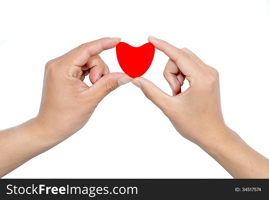 Love concept. holding a red heart in hands. Love concept. holding a red heart in hands.