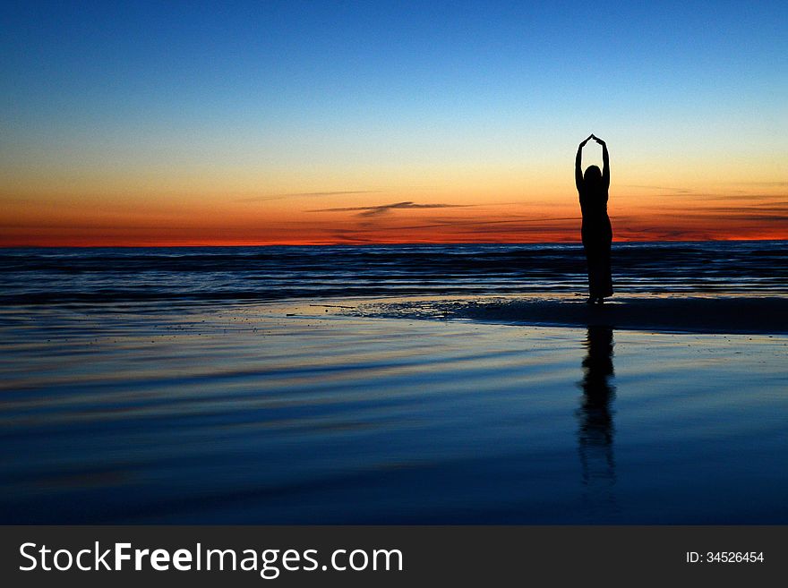 Photo of woman silhouette during the sunset. Photo of woman silhouette during the sunset.