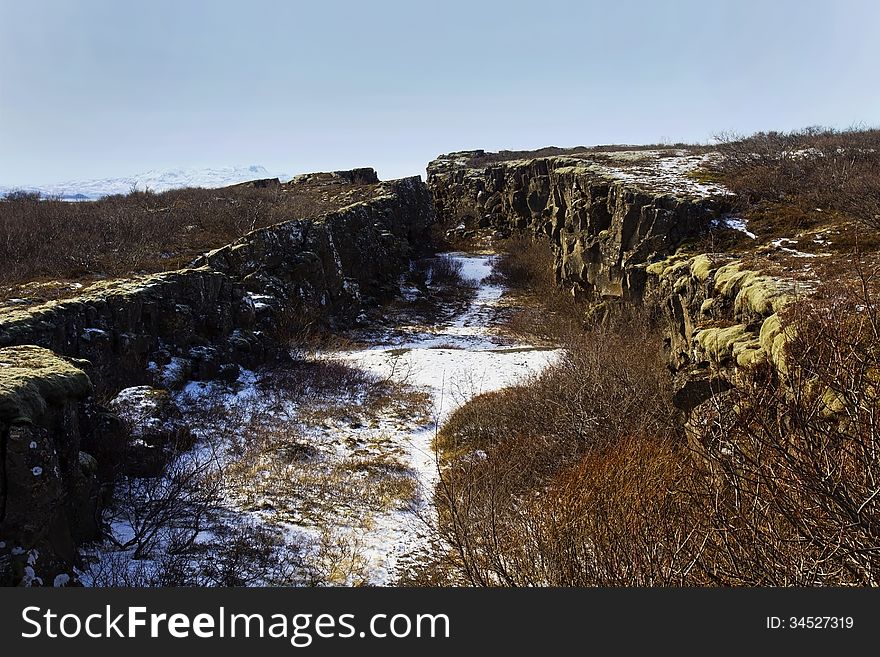 Rift formed by movement in the Tectonic Plate along the North Atlantic Ridge, Pingvellir, Thingvellir National Park, Iceland. Rift formed by movement in the Tectonic Plate along the North Atlantic Ridge, Pingvellir, Thingvellir National Park, Iceland