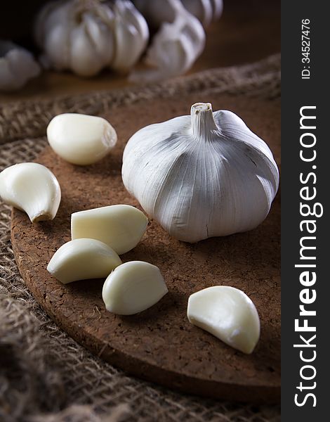 Fresh garlic on wooden table