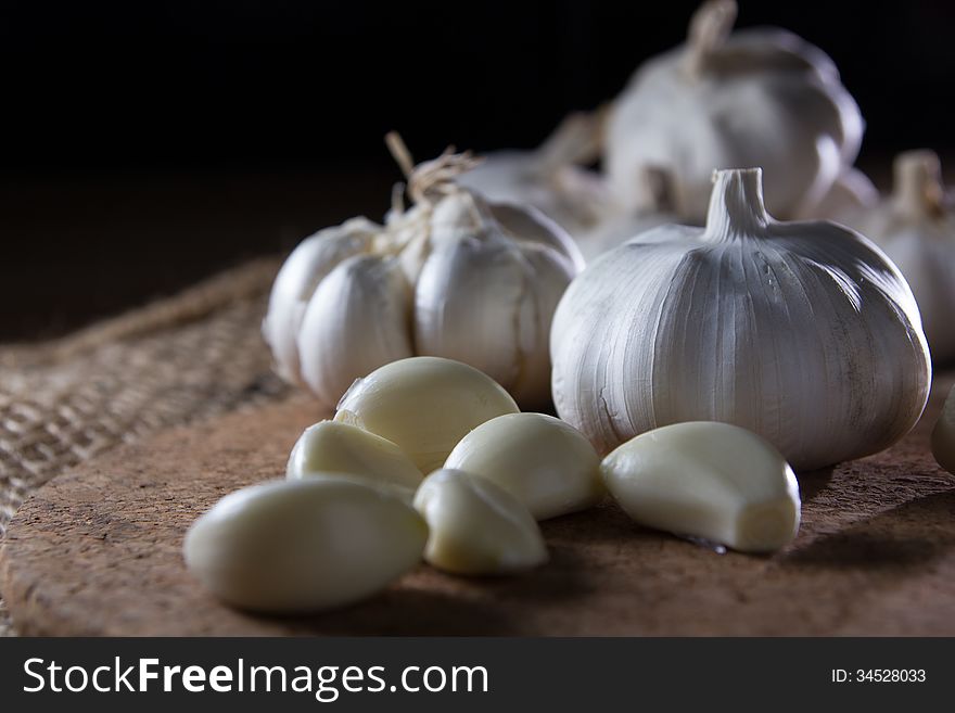 Fresh garlic on wooden table