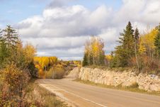 Winding Highway Between A Rock Ridge And Trees Royalty Free Stock Photos Winding Highway Between A Rock Ridge And Trees Royalty Free Stock Photos