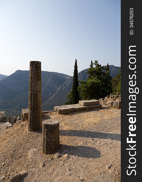 Delphi is both an archaeological site and a modern town in Greece on the south-western spur of Mount Parnassus in the valley of Phocis. The site of Delphi was believed to be determined by Zeus when he sought to find the centre of Grandmother Earth (or Gaia). He sent two eagles flying from the eastern and western extremities, and the path of the eagles crossed over Delphi where the omphalos, or navel of Gaia was found.
Delphi was the site of the Delphic oracle, the most important oracle in the classical Greek world, and became a major site for the worship of the god Apollo after he slew Python, a dragon who lived there and protected the navel of the Earth. Python is claimed by some to be the original name of the site in recognition of Python which Apollo defeated. Delphi is both an archaeological site and a modern town in Greece on the south-western spur of Mount Parnassus in the valley of Phocis. The site of Delphi was believed to be determined by Zeus when he sought to find the centre of Grandmother Earth (or Gaia). He sent two eagles flying from the eastern and western extremities, and the path of the eagles crossed over Delphi where the omphalos, or navel of Gaia was found.
Delphi was the site of the Delphic oracle, the most important oracle in the classical Greek world, and became a major site for the worship of the god Apollo after he slew Python, a dragon who lived there and protected the navel of the Earth. Python is claimed by some to be the original name of the site in recognition of Python which Apollo defeated.