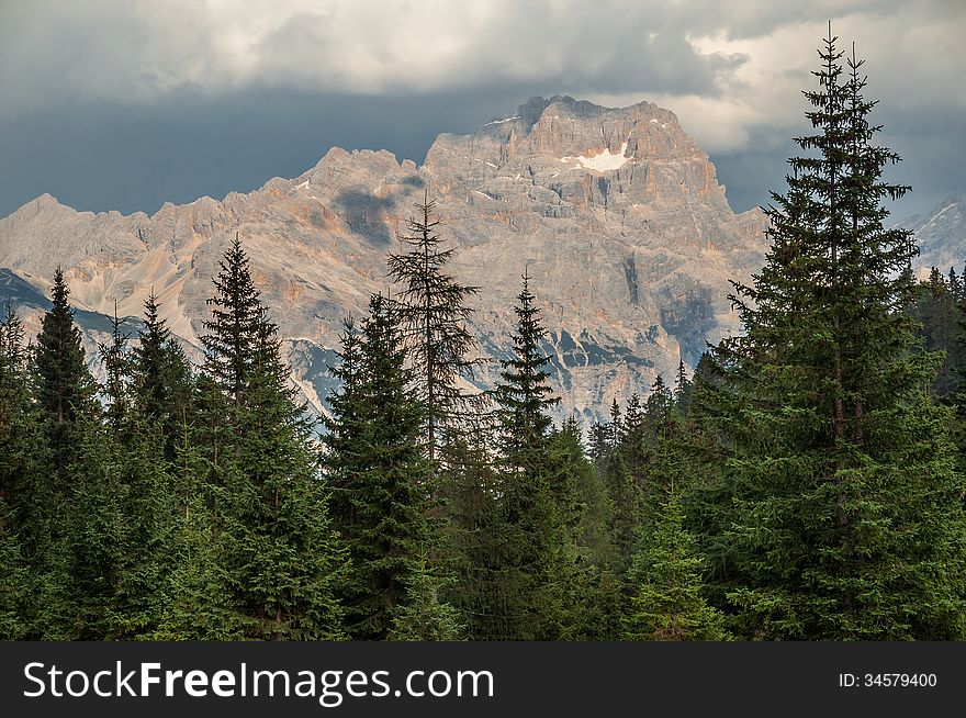 Dolomites Mountains in Italy in the stormy weather before sunset. Dolomites Mountains in Italy in the stormy weather before sunset.