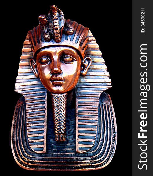 Figure of Ramses II on black background