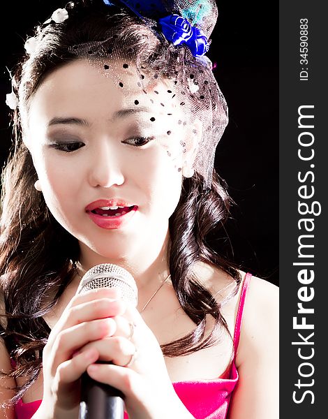 Concert young Asian singer of the girl. Concert young Asian singer of the girl