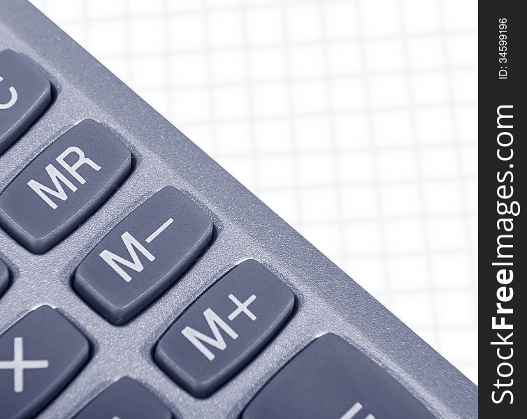 Office supplies, calculator on a white paper background