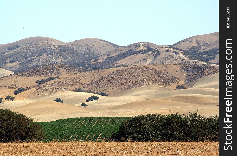 Rolling hills bordering the rich farming lands of California's Joaquin Valley. Rolling hills bordering the rich farming lands of California's Joaquin Valley