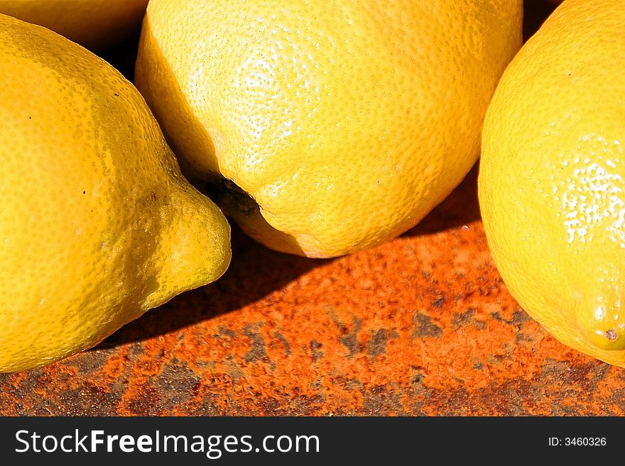 Lemons on a rusty bowl, found in my home-town