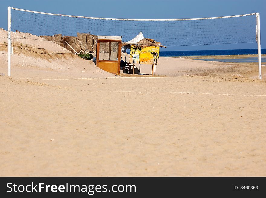 Volleyball in the summer beach.