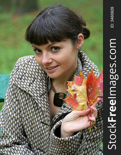 Beautiful woman walking in the autumn park. Beautiful woman walking in the autumn park