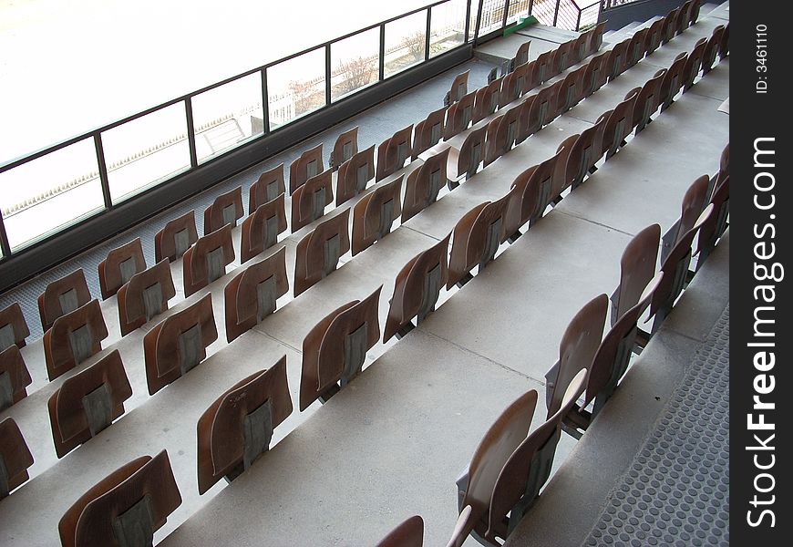 A glacis of the horse trot stadium in Milan with the seats in row. A glacis of the horse trot stadium in Milan with the seats in row