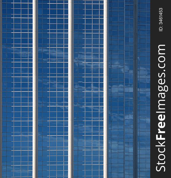 Clouds reflecting in the windows of a corporate building. Clouds reflecting in the windows of a corporate building