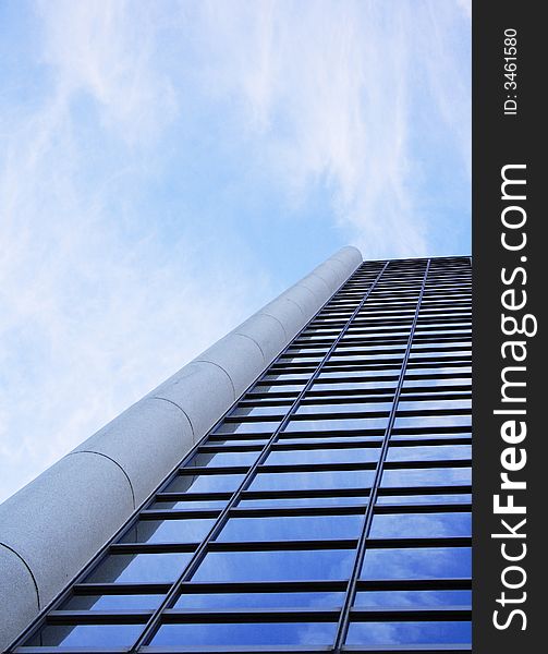 Clouds reflecting in the windows of a corporate building. Clouds reflecting in the windows of a corporate building