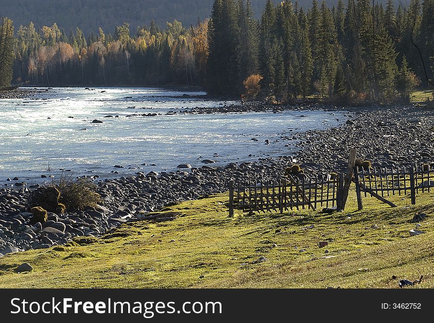 Meadow land infront of rocky river. Meadow land infront of rocky river