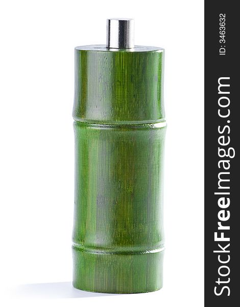 Green pepper mill isolated on white background