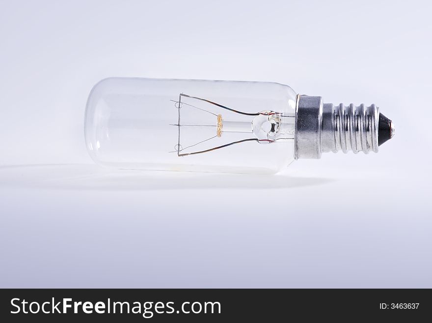 White electric bulb over a white background. White electric bulb over a white background