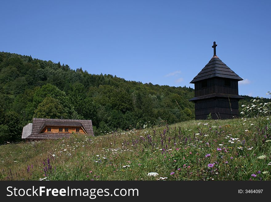 Small wooden chapel at the end of the village. Small wooden chapel at the end of the village