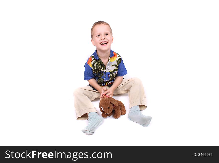 Boy and his toy on the white background. Boy and his toy on the white background