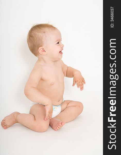 Smiling baby girl, toddler, isolated on the white background