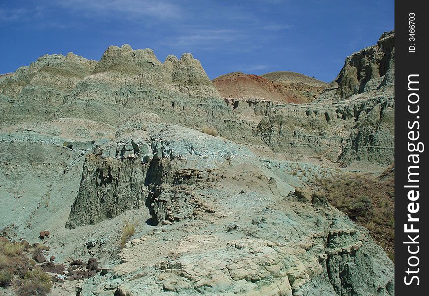 The picture of Blue Basin taken on the trail in Sheep Rock Unit of John Day Fossils National Monument in Oregon