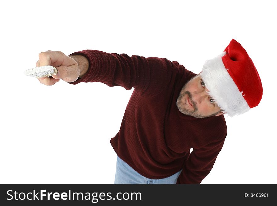 Fourty something man in holiday hat painting with white paint brush. Focus on brush and hand. Fourty something man in holiday hat painting with white paint brush. Focus on brush and hand.