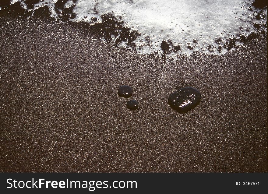 Black sandy shore in the west of Gomera near Alojera