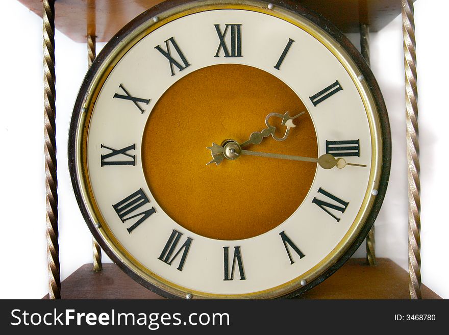 Old-fashioned clock over white