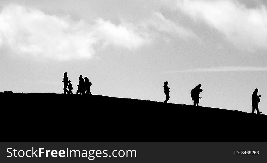 Silhouette of peoples over Etna volcano. Silhouette of peoples over Etna volcano