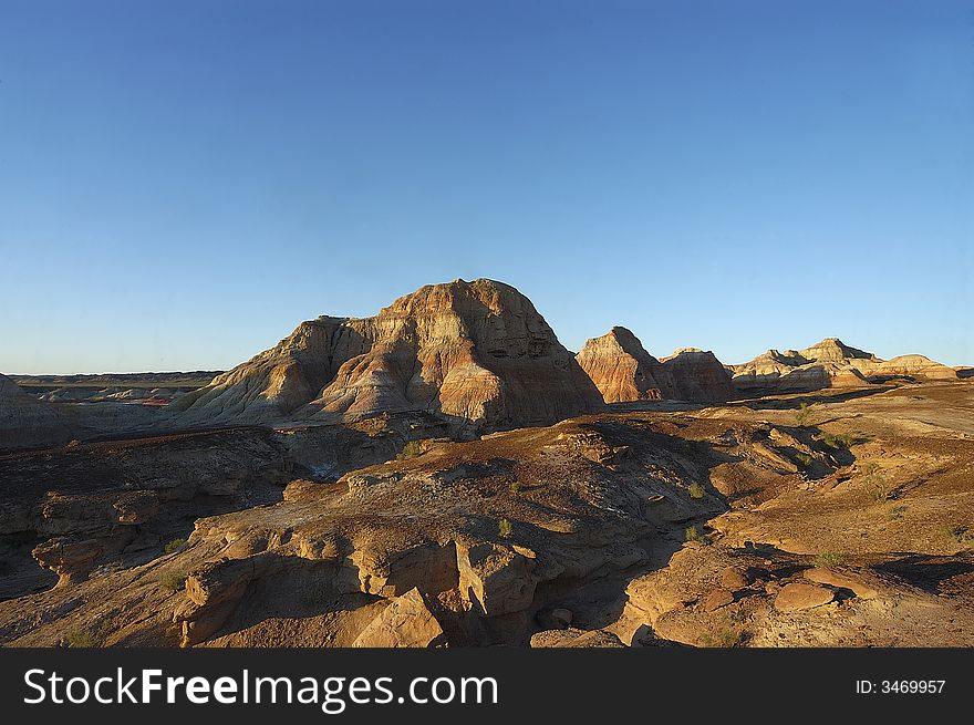 Rocky hill blue sky red color