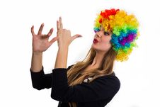 Cheerful Girl And Multi-colored Wig Royalty Free Stock Image Cheerful Girl And Multi-colored Wig Royalty Free Stock Image