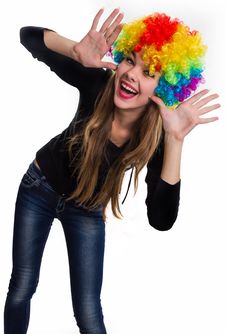 Cheerful Girl And Multi-colored Wig Royalty Free Stock Image Cheerful Girl And Multi-colored Wig Royalty Free Stock Image