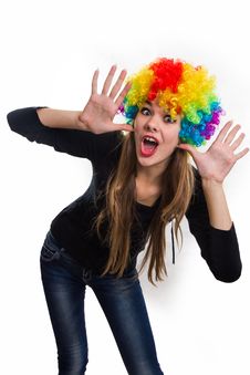 Cheerful Girl And Multi-colored Wig Stock Image Cheerful Girl And Multi-colored Wig Stock Image