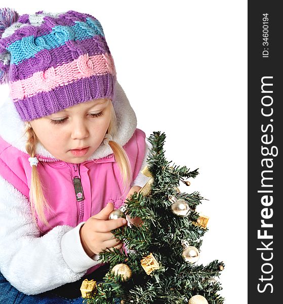 Portrait Of A Little Girl Dressed In Winter Clothes