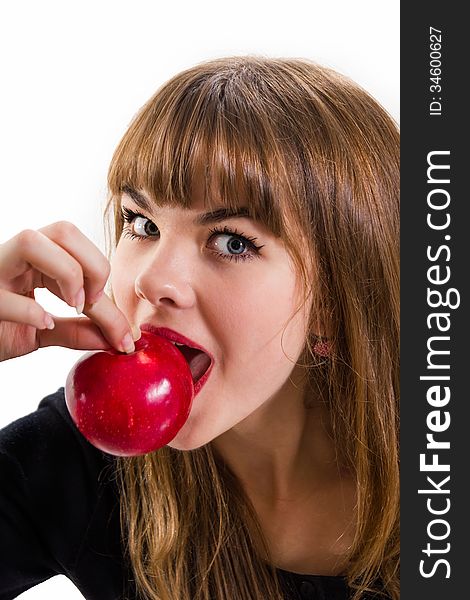 The pretty, young Girl and red apple. Isolated on white.