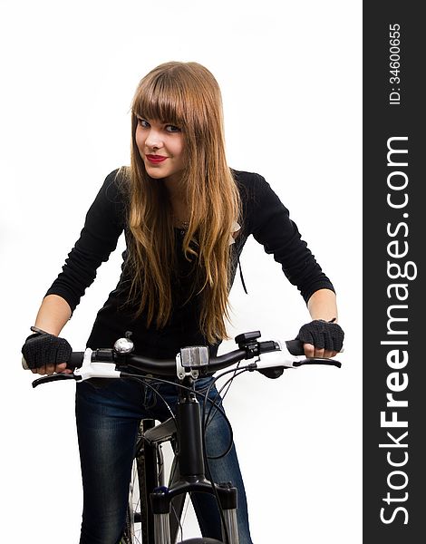 The pretty, young girl with bike. Isolated on white.