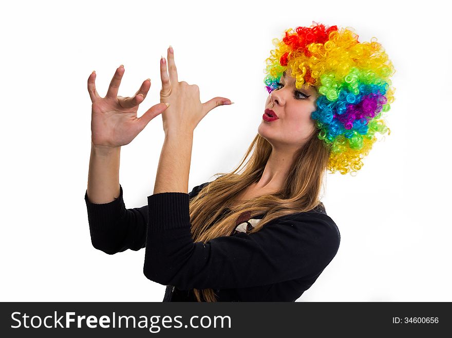 Cheerful girl and multi-colored wig