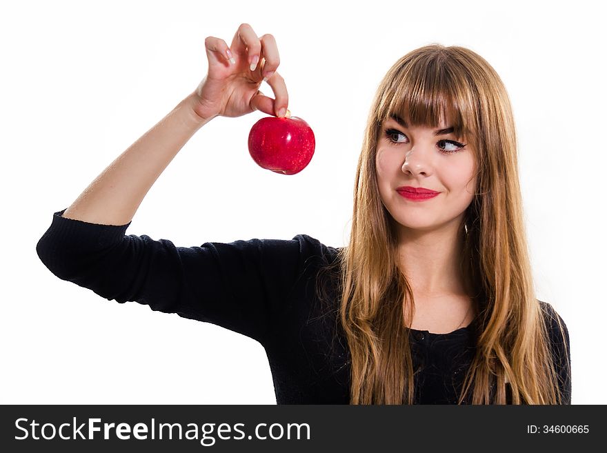 The pretty, young Girl and red apple. Isolated on white.