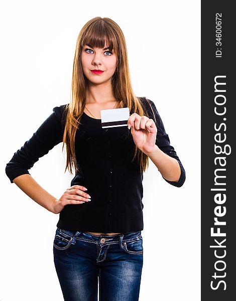 The pretty, young girl holds out business card. Isolated on white.